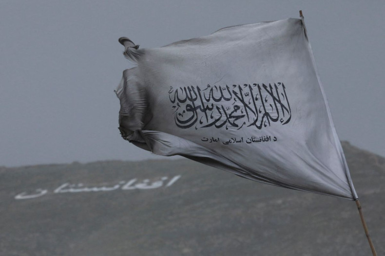 The Taliban flag is seen in a marketplace in Kabul, Afghanistan, May 10, 2022. 
