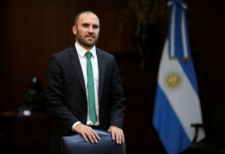 Argentina's Economy Minister Martin Guzman poses for a picture before an interview with Reuters at the Economy Ministry, in Buenos Aires, Argentina December 10, 2020.   