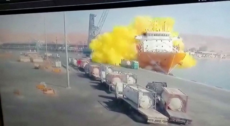 CCTV footage shows a storage tank containing chlorine gas crashing into a ship after falling from a winch, in Aqaba, Jordan June 27, 2022, in this still image taken from a handout video.  Jordan TV/Handout via REUTERS
