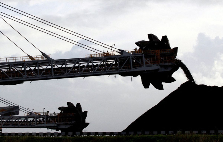 A stacker/reclaimer places coal in stockpiles at the coal port in Newcastle June 6, 2012. 