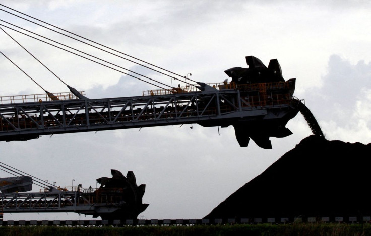 A stacker/reclaimer places coal in stockpiles at the coal port in Newcastle June 6, 2012.