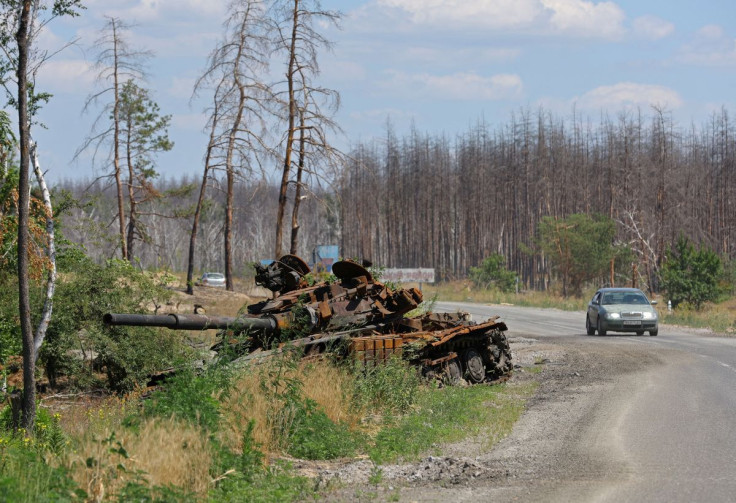 A view shows a destroyed tank alongside the road during Ukraine-Russia conflict outside the city of Sievierodonetsk in the Luhansk Region, Ukraine July 1, 2022. 