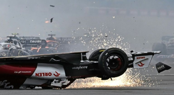 Zhou Guanyu escaped uninjured from a horror pile-up at the start