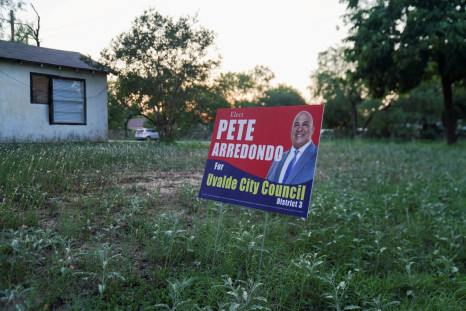A political sign for Pete Arredondo, the Uvalde School District police chief, who ihad been scheduled to be sworn in with the Uvalde City Council is seen in Uvalde, Texas, U.S. May 29, 2022. 