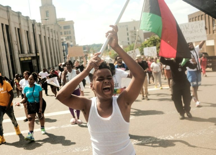 Demonstrators gather outside Akron City Hall to protest the killing of 25 year old Black man Jayland Walker