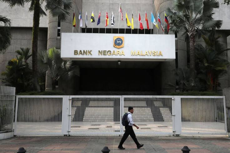 A man walks past the entrance of Central Bank of Malaysia (Bank Negara Malaysia) in Kuala Lumpur, Malaysia, July 31, 2019. Picture taken July 31, 2019.