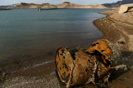A rusted metal barrel, near the location of where a different drum was found containing a human body, sits exposed on the shore of Lake Mead, in Boulder City, Nevada outside Las Vegas