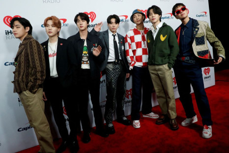 BTS poses at the carpet during arrivals ahead of iHeartRadio Jingle Ball concert at The Forum, in Inglewood, California, U.S., December 3, 2021. 