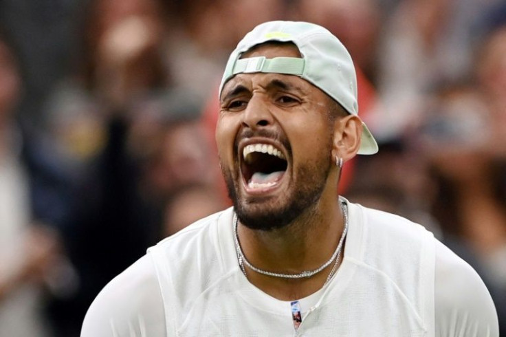 Nick Kyrgios celebrates his win against Stefanos Tsitsipas in the Wimbledon third round