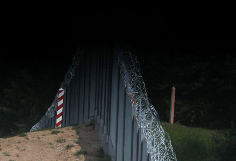 A view of the wall erected to prevent migrant-crossing on the Polish-Belarusian border amid the migrant crisis near Kuznica, Poland June 30, 2022. 