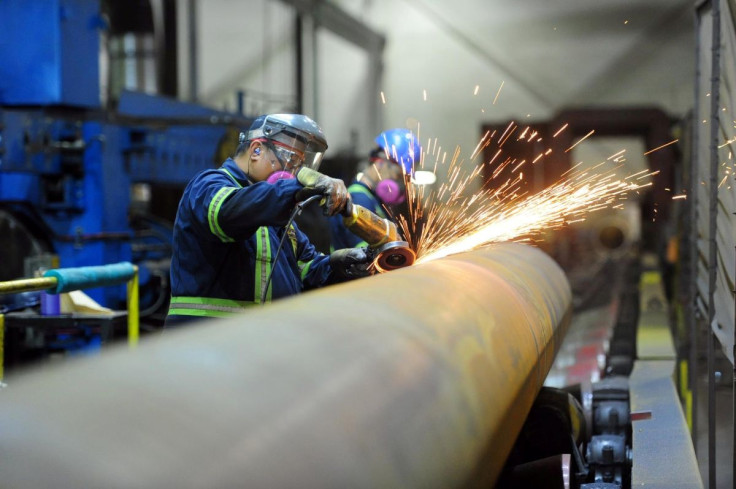Workers are seen at Bri-Steel Manufacturing, a manufacturer and distributer of large diameter seamless steel pipes, in Edmonton, Alberta, Canada June 21, 2018.