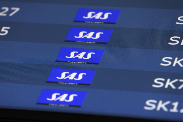 Scandinavian Airlines (SAS) flights are seen listed at Copenhagen Airport Kastrup in Copenhagen, Denmark, July 3, 2022.