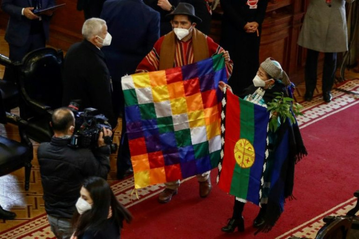 Elisa Loncon (R), representative of the Mapuche people for the Chilean Constitutional Convention, attends the presentation of the final draf at the National Congress in Santiago