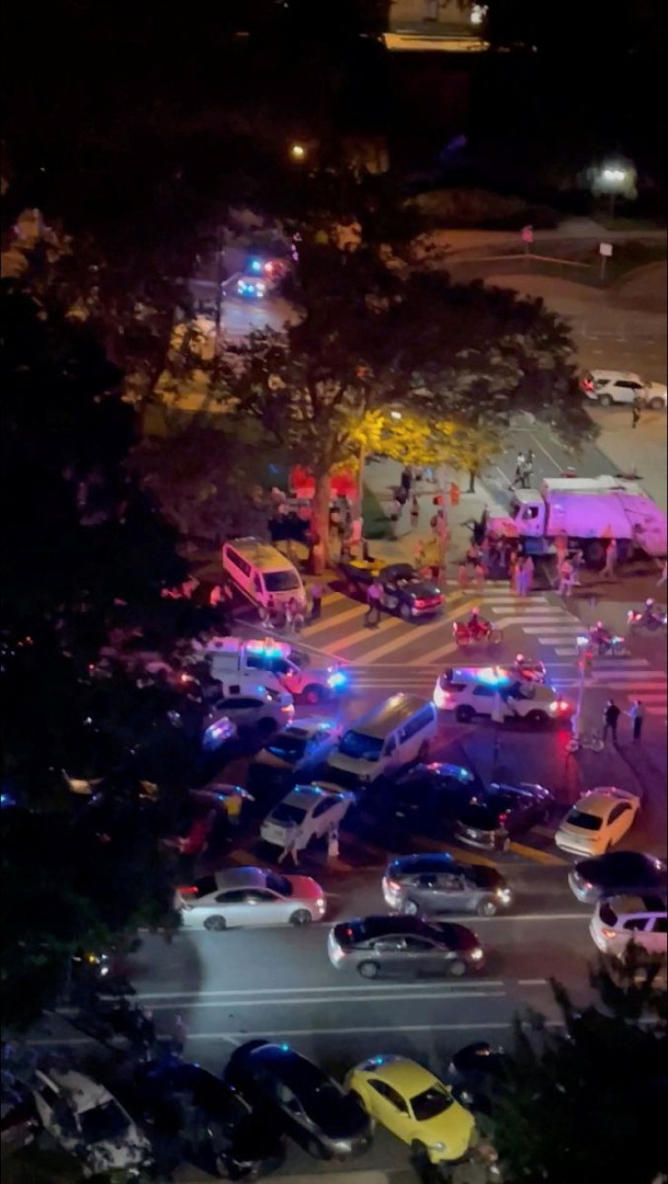 Police respond to a shooting in Philadelphia, Pennsylvania, U.S., July 4, 2022 in this screen grab obtained from a social media video. Audrey Schneider/via REUTERS