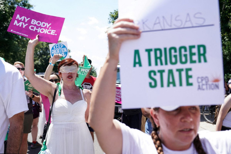 Abortion rights activists participate in a demonstration outside of the U.S. Supreme Court in Washington, D.C., U.S., June 30, 2022. 