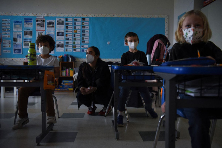 Marisela Maddox, a parent of students Atlas and Hero Smookler, works as a substitute teacher at the Austin Jewish Academy as the spread of the Omicron variant leads to teacher shortages amid the coronavirus disease (COVID-19) pandemic in Austin, Texas, U.