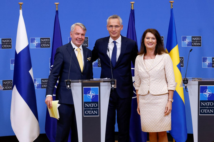 Sweden's Foreign Minister Ann Linde and Finland's Foreign Minister Pekka Haavisto attend a news conference with NATO Secretary General Jens Stoltenberg, after signing their countries' accession protocols at the alliance's headquarters in Brussels, Belgium