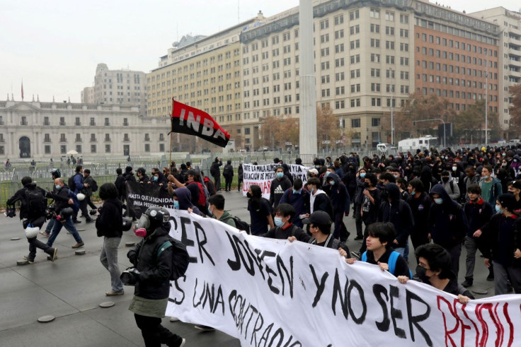 Demonstrators take part in a protest called by students against the Chilean government to demand increased scholarships, better infrastructure in schools and changes to the public education system in Santiago, Chile May 27, 2022. 