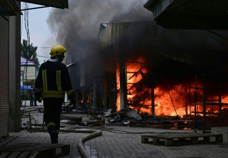 The central market in  Sloviansk goes up in flames after a suspected Russian missile attack