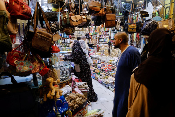 Muslims pilgrims shop in Mecca, Saudi Arabia, July 5, 2022.