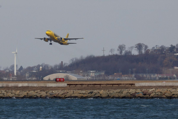 A Spirit airlines flight takes off from Logan Airport in Boston, Massachusetts, U.S., January 19, 2022.   
