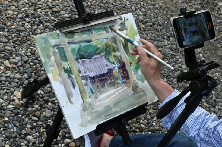 His videos range from how to paint cherry blossom to snapshots of daily life, such as cooking bamboo shoots dug up from his garden