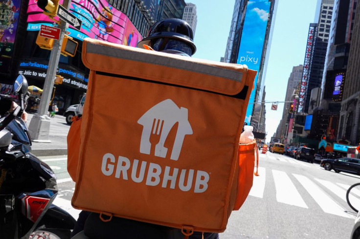 A Grubhub delivery person rides in Manhattan, New York City, U.S., May 9, 2022. 