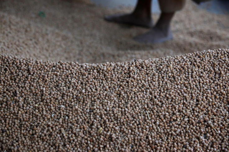 A mound of chickpeas is seen as they are packaged to sell at a wholesale market in Karachi February 21, 2010.