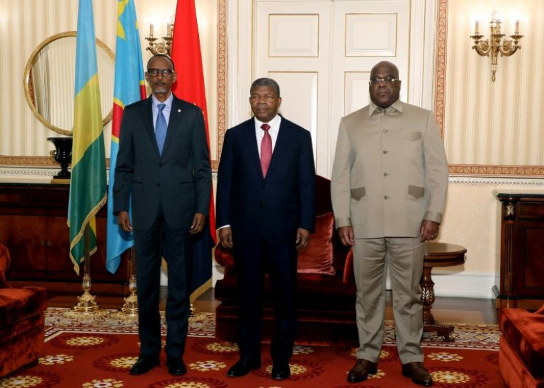 Rwanda President Paul Kagame (L), Angola President Joao Lourenco (C) and Democratic Republic of Congo President Felix Tshisekedi (R) met for talks in Luanda on July 6, 2022, after a surge in violence in eastern DRC