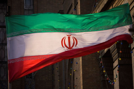 Iranian flag is pictured in front of Iran's Foreign Ministry building in Tehran November 23, 2009. 