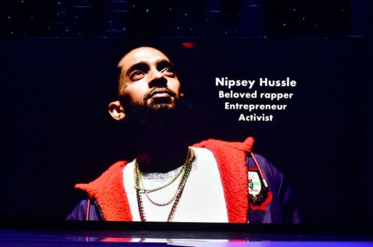 The month after his 2019 killing, thousands of people gathered for a service in Nipsey Hussle's honor, with Stevie Wonder and Snoop Dogg among those paying tribute