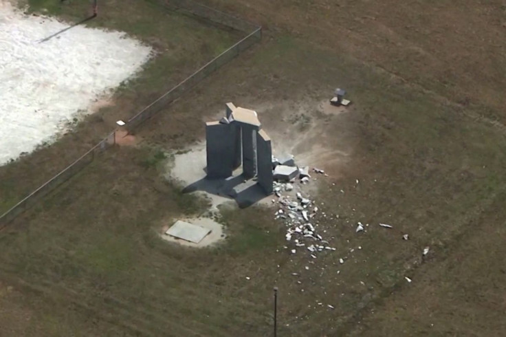 Rubble is cast around the Georgia Guidestones after an explosion in Elberton, Georgia, U.S., July 6, 2022 in a still image from video.   ABC Affiliate WSB-TV via REUTERS  
