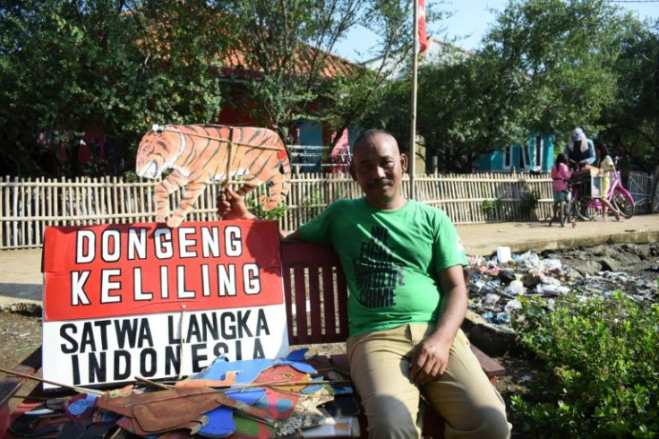 Samsudin, who like many Indonesians uses only one name, travels from village to village across the archipelago nation on an old bicycle