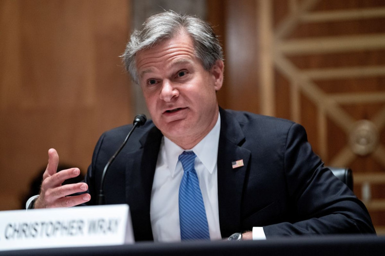 FBI Director Christopher Wray testifies during a Senate Homeland Security and Governmental Affairs hearing to discuss security threats 20 years after the 9/11 attacks, in Washington, D.C., U.S. September 21, 2021. Greg Nash/Pool via 