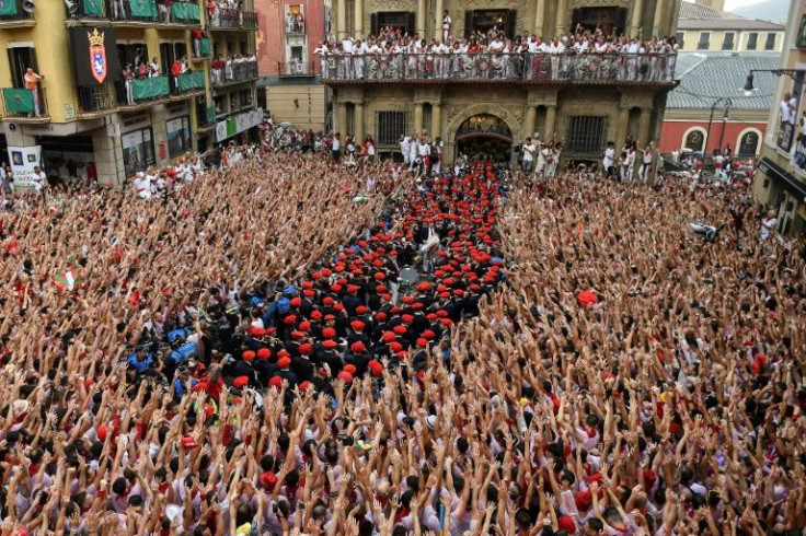 People began drinking hours before the festival began at midday, with the municipal band regaling the crowds in the square