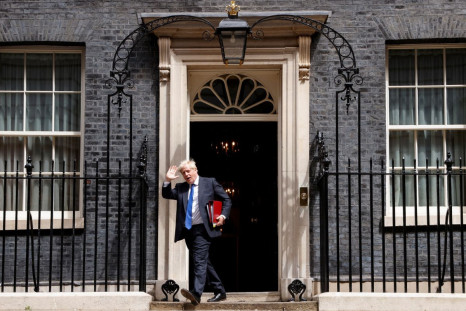 British Prime Minister Boris Johnson walks at Downing Street, in London, Britain, July 6, 2022. 