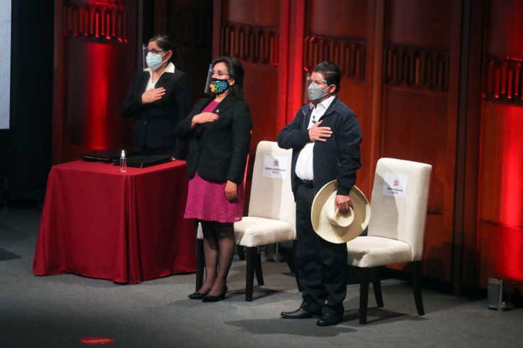 Peruvian President-elect Pedro Castillo and his Vice President Dina Boluarte take oath of office before receiving credentials from election authority after confirmed win, in Lima, Peru, July 23, 2021.