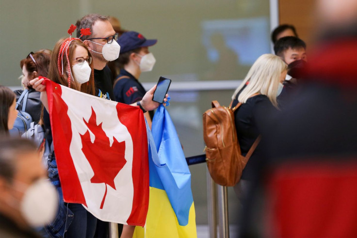 Ukrainians fleeing Russia's invasion arrive on the first of three federally chartered flights to the city of Winnipeg, home to a large Ukrainian diaspora, at the James Armstrong Richardson International Airport in Winnipeg, Manitoba, Canada, May 23, 2022.