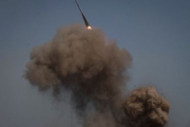 Ukrainian service members fire a BM-27 Uragan multiple rocket launch system in Donbas region, amid Russia's attack on Ukraine July 7, 2022. 