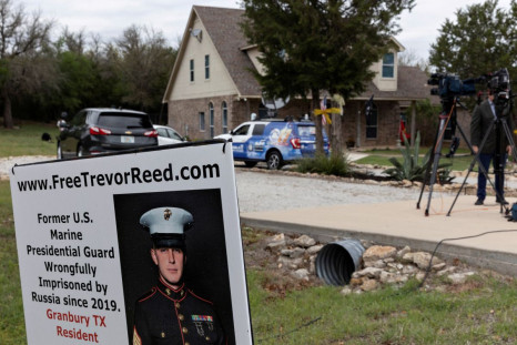 News media crews assemble outside the family home of former U.S. Marine Trevor Reed, who was convicted in 2019 in Russia and released in exchange for Russian pilot Konstantin Yaroshenko, in Granbury, Texas, U.S. April 27, 2022.  