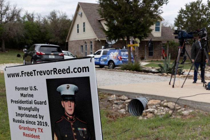 News media crews assemble outside the family home of former U.S. Marine Trevor Reed, who was convicted in 2019 in Russia and released in exchange for Russian pilot Konstantin Yaroshenko, in Granbury, Texas, U.S. April 27, 2022.