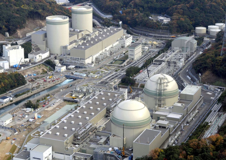 An aerial view shows No. 4 (front L), No. 3 (front R), No. 2 (rear L) and No. 1 reactor buildings at Kansai Electric Power Co.'s Takahama nuclear power plant in Takahama town, Fukui prefecture, in this photo taken by Kyodo November 27, 2014.    Kyodo/File