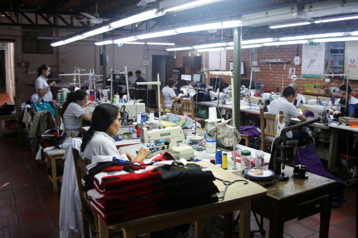 Employees make uniforms at the company Uniformes UNO, as Colombia's President-elect Gustavo Petro aims to normalize relations and encourage trade with Venezuela, in Cucuta, Colombia June 28, 2022. Picture taken June 28, 2022.