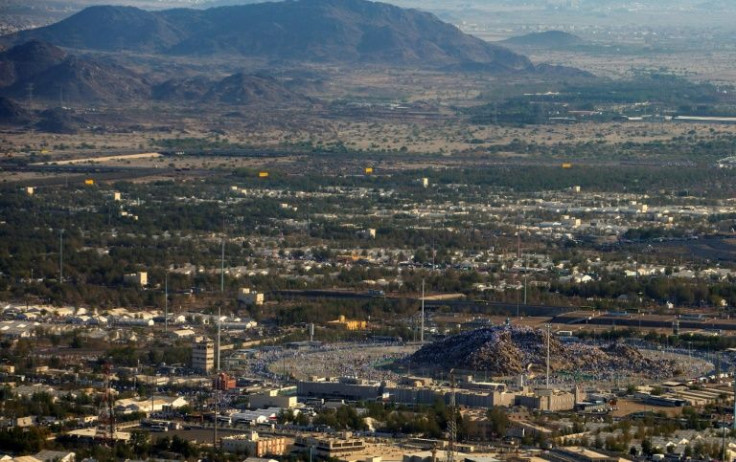 An aerial view shows Muslim pilgrims gathering atop Mount Arafat
