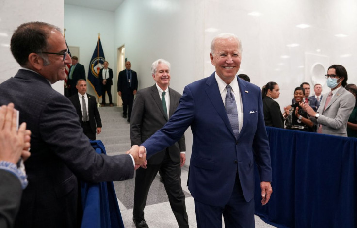 U.S. President Joe Biden is welcomed by Central Intelligence Agency employees during his visit to CIA Headquarters in Langley, Virginia, U.S., July 8, 2022. 