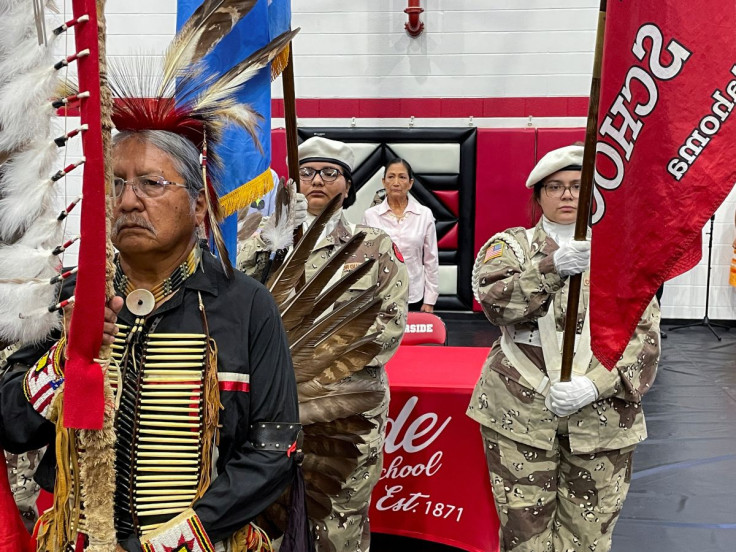U.S. Interior Secretary Deb Haaland stands behind a Native American color guard ahead of an event in Anadarko, Oklahoma, U.S., July 9, 2022.
