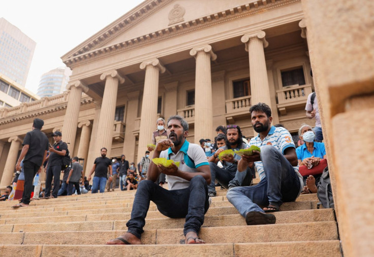Demonstrators eat breakfast after entering the Presidential Secretariat premises, after President Gotabaya Rajapaksa fled, amid the country's economic crisis, in Colombo, Sri Lanka July 10, 2022.