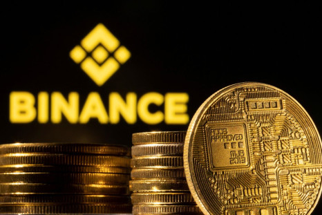 A representation of cryptocurrency is seen in front of Binance logo in this illustration taken, March 4, 2022. 