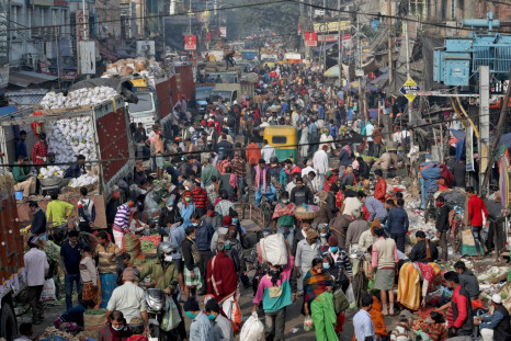 People shop in a crowded market amidst the spread of the coronavirus disease (COVID-19), in Kolkata, India, January 6, 2022. 