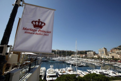 A flag announcing the wedding of Prince Albert II of Monaco and his fiancee Charlene Wittstock is seen above Monaco port